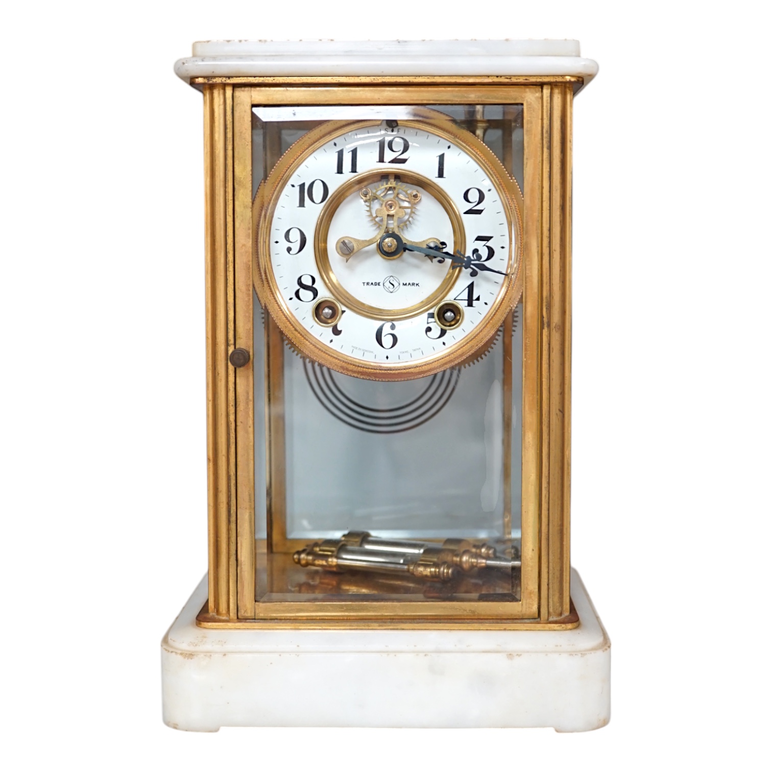 A Japanese four glass brass and alabaster mantel clock by Seikosha, with brocot type escapement and outside rack strike, striking on a coiled gong, height 27.5cm. Condition - fair to good.